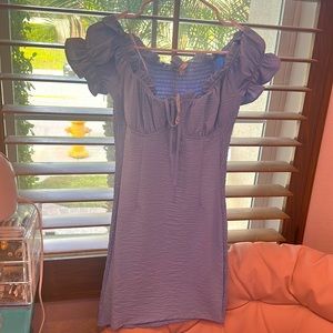 I am selling a new with tags light blue dress perfect for any occasion.